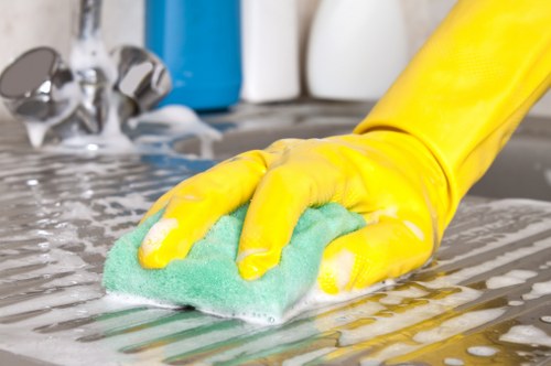 Close-up of fabric and leather sofa cleaning methods