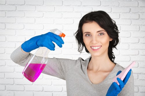 Professional office cleaning supplies and sanitized workspace surfaces